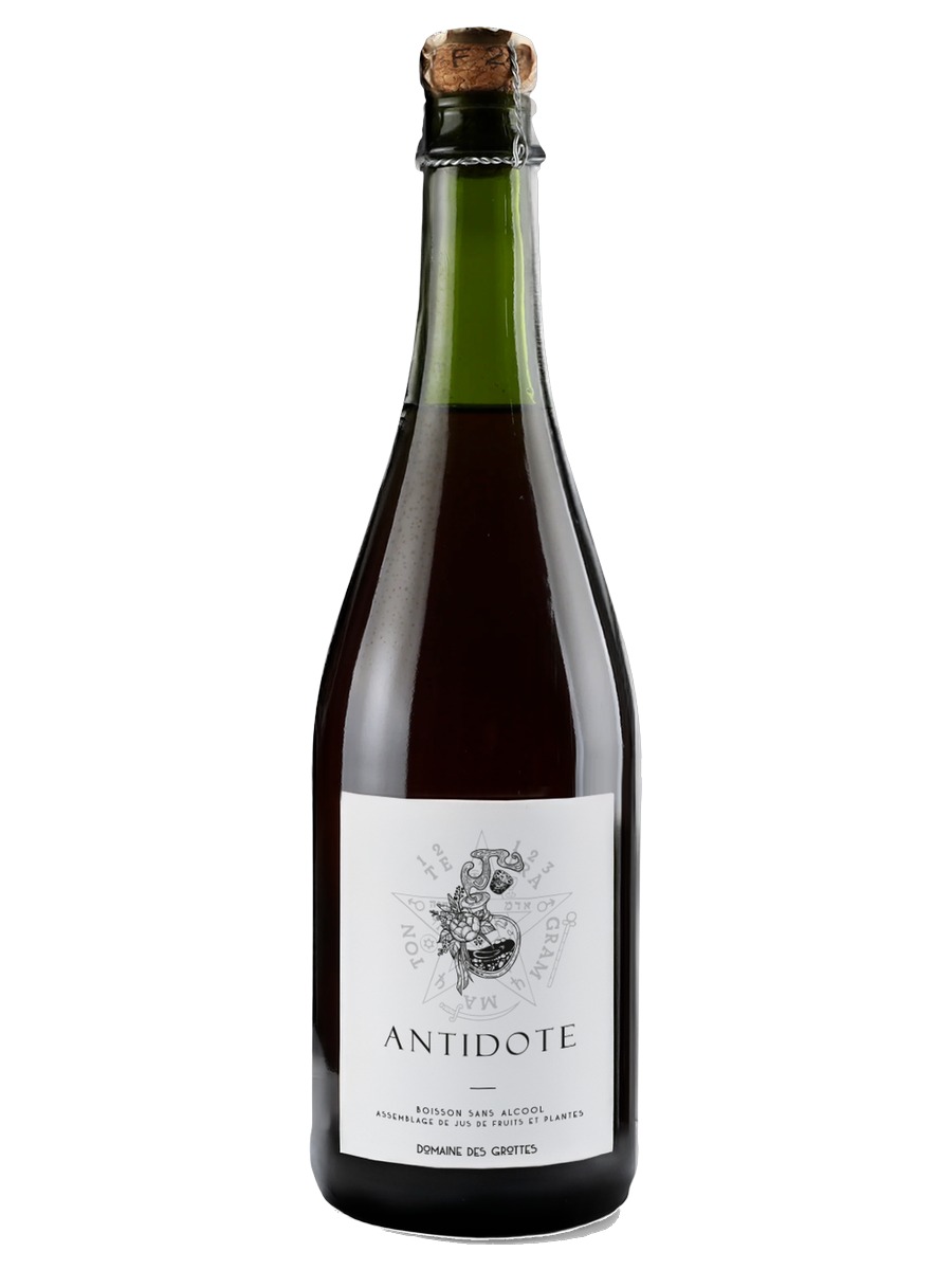 Domaine des Grottes Antidote bottle with cork and wire cage, dark red contents and a white label with botanical flask illustration