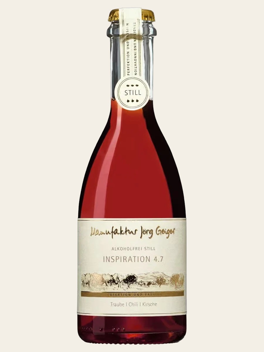 One Jörg Geiger Inspiration 4.7 bottle labeled Traube, Chili, Kirsche